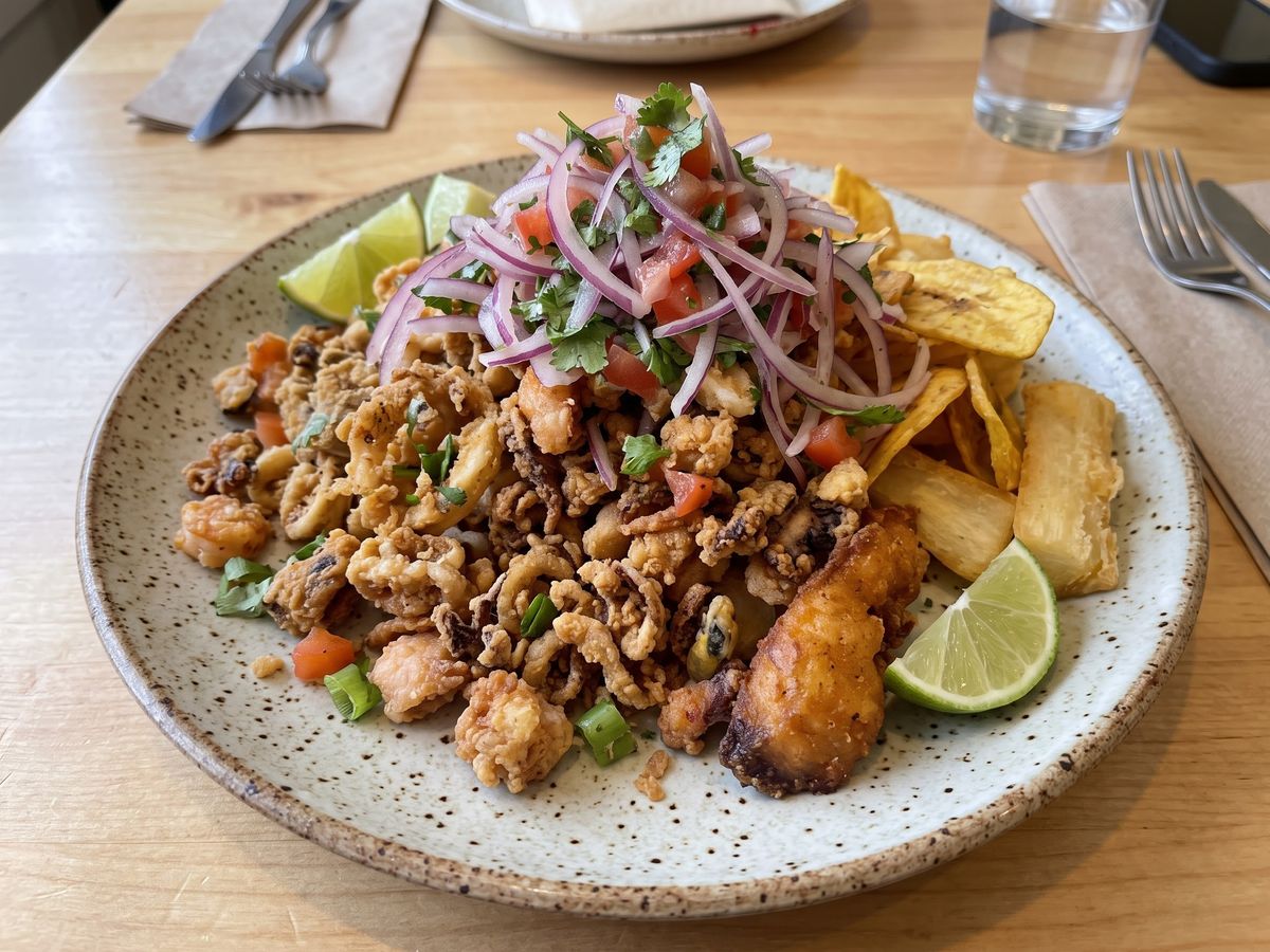 Jalea de mariscos: crispy fried seafood with pickled onion salad, yuca and plantain chips
